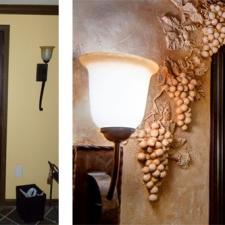 Before and after faux chiseled grape motif with tuscan plaster walls added around this wine room entry with faux bronze entry door